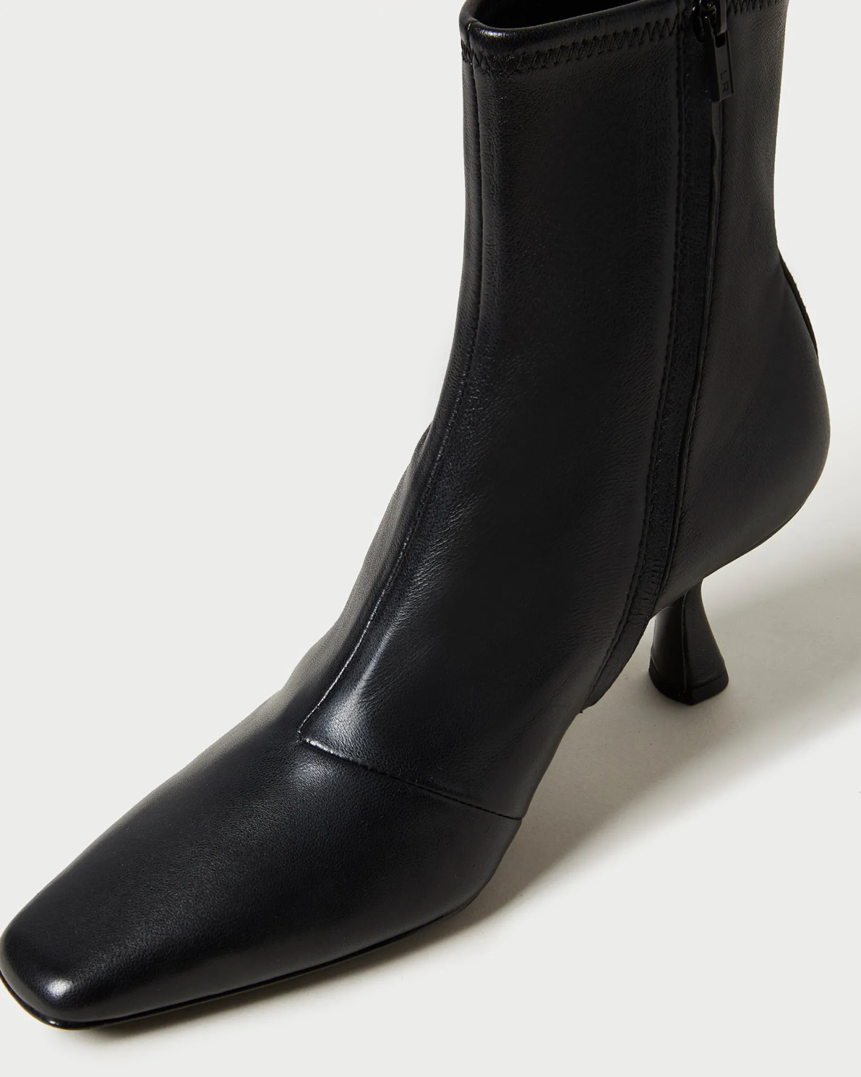 Thandy Black Curved Heel Bootie Boots