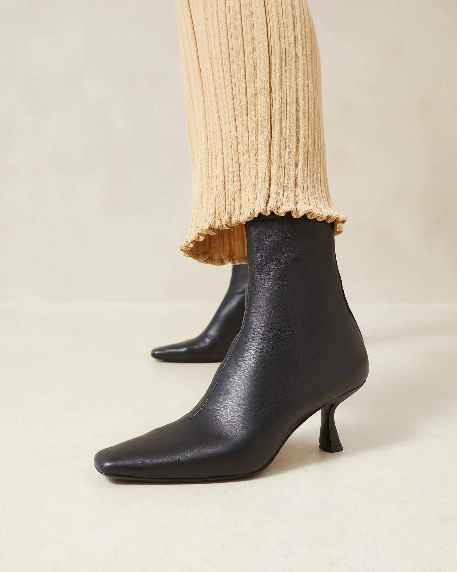 Thandy Black Curved Heel Bootie Boots