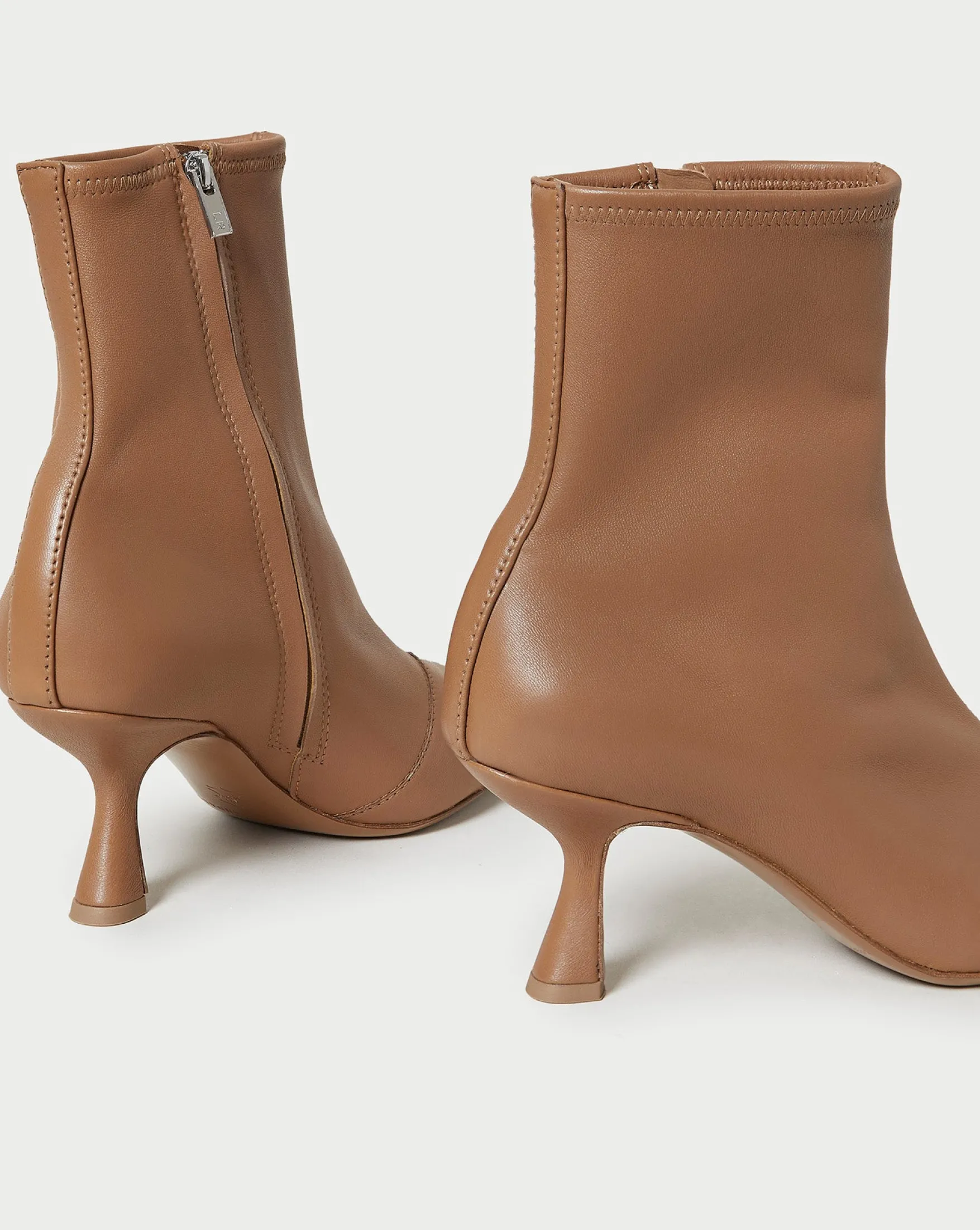 Thandy Black Curved Heel Bootie Boots