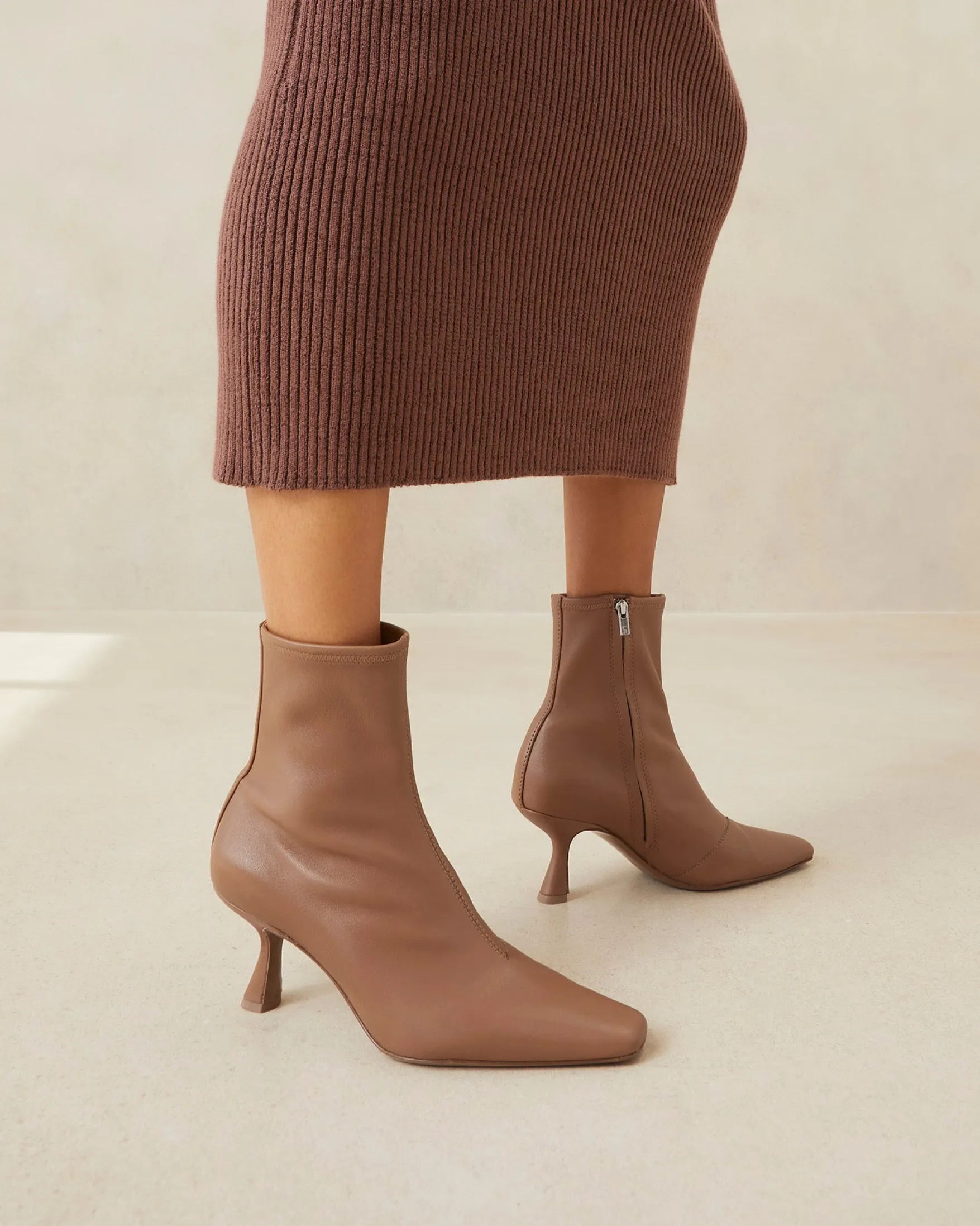 Thandy Black Curved Heel Bootie Boots